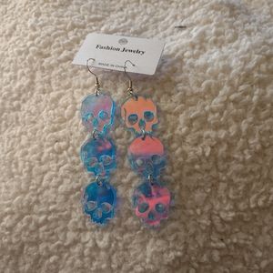 Iridescent skull earrings